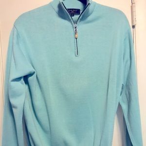Long sleeve knit golf sweater.